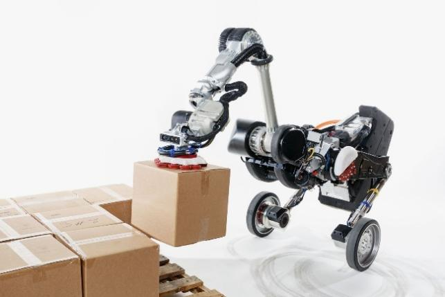 Industrial lifting robot handling heavy loads safely in logistics operations